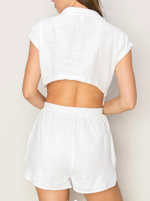 White romper with cut out back